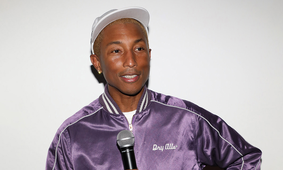 Pharrell Williams with purple tracksuit