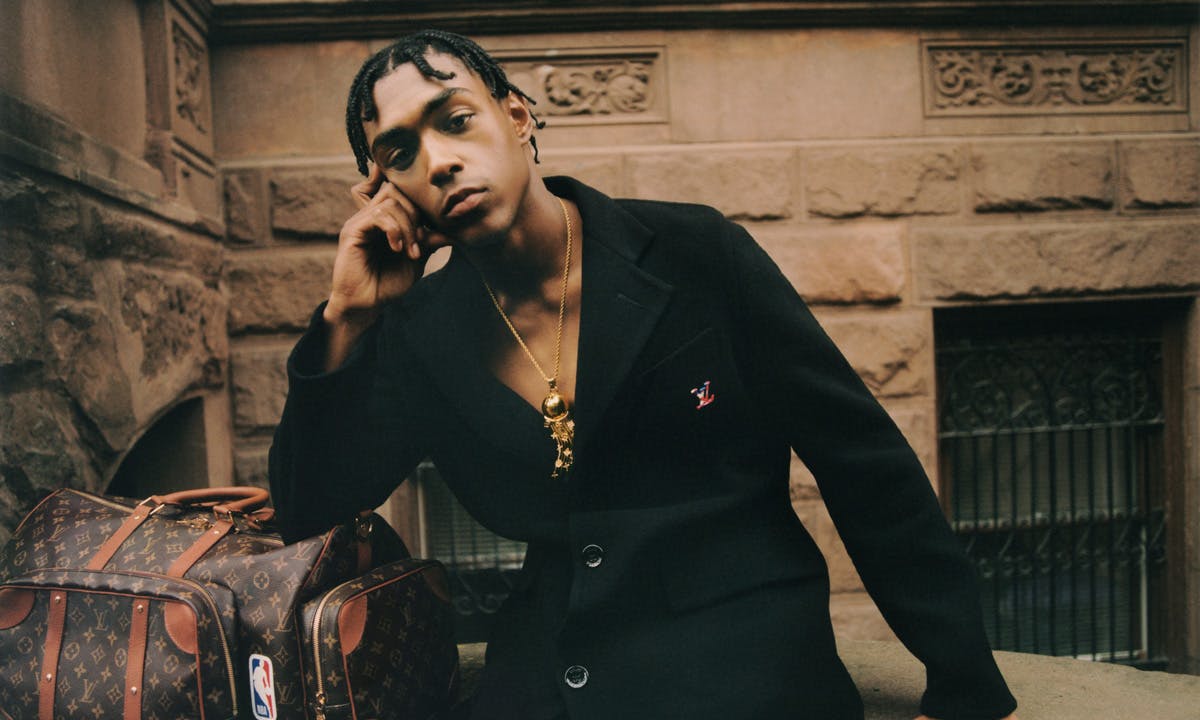 Louis Vuitton model with NBA collection bag