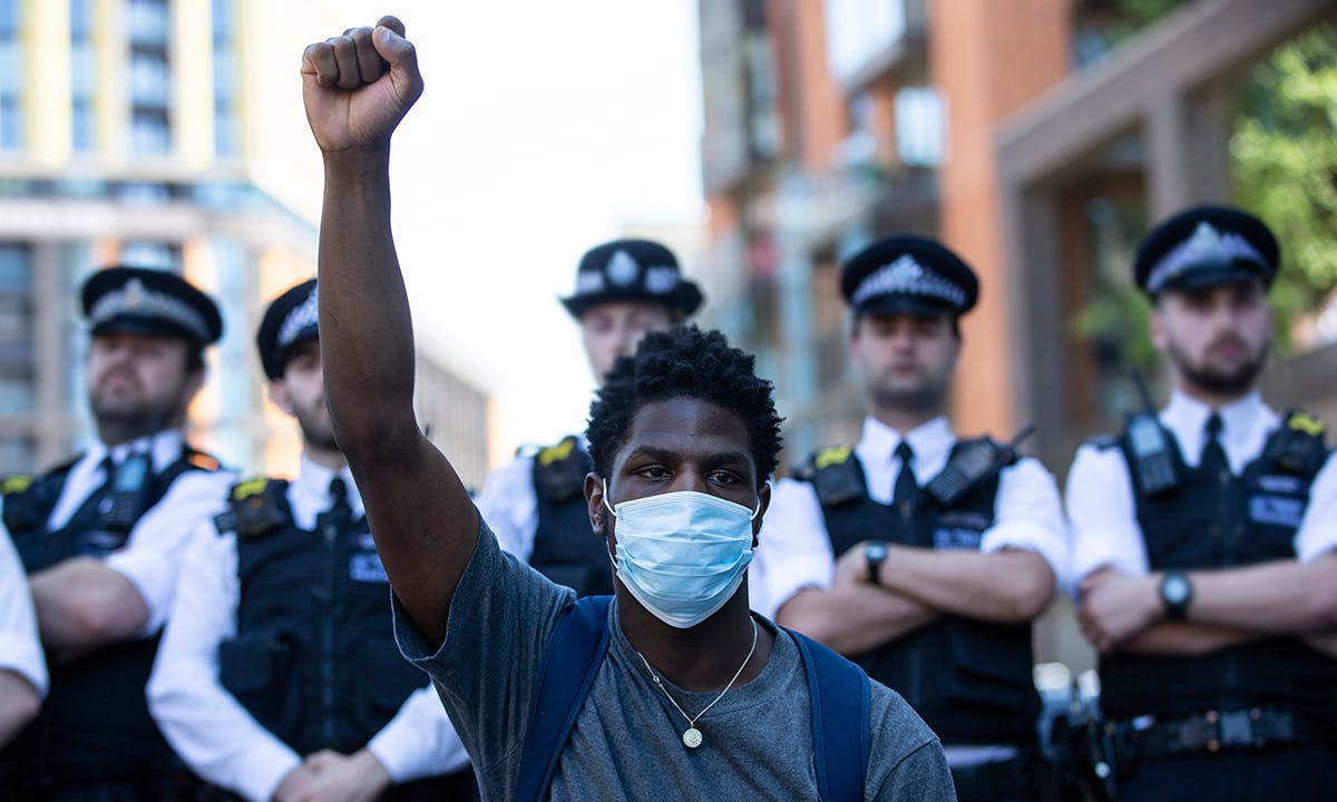 people join in a spontaneous Black Lives Matter march through central London to protest the death of George Floyd