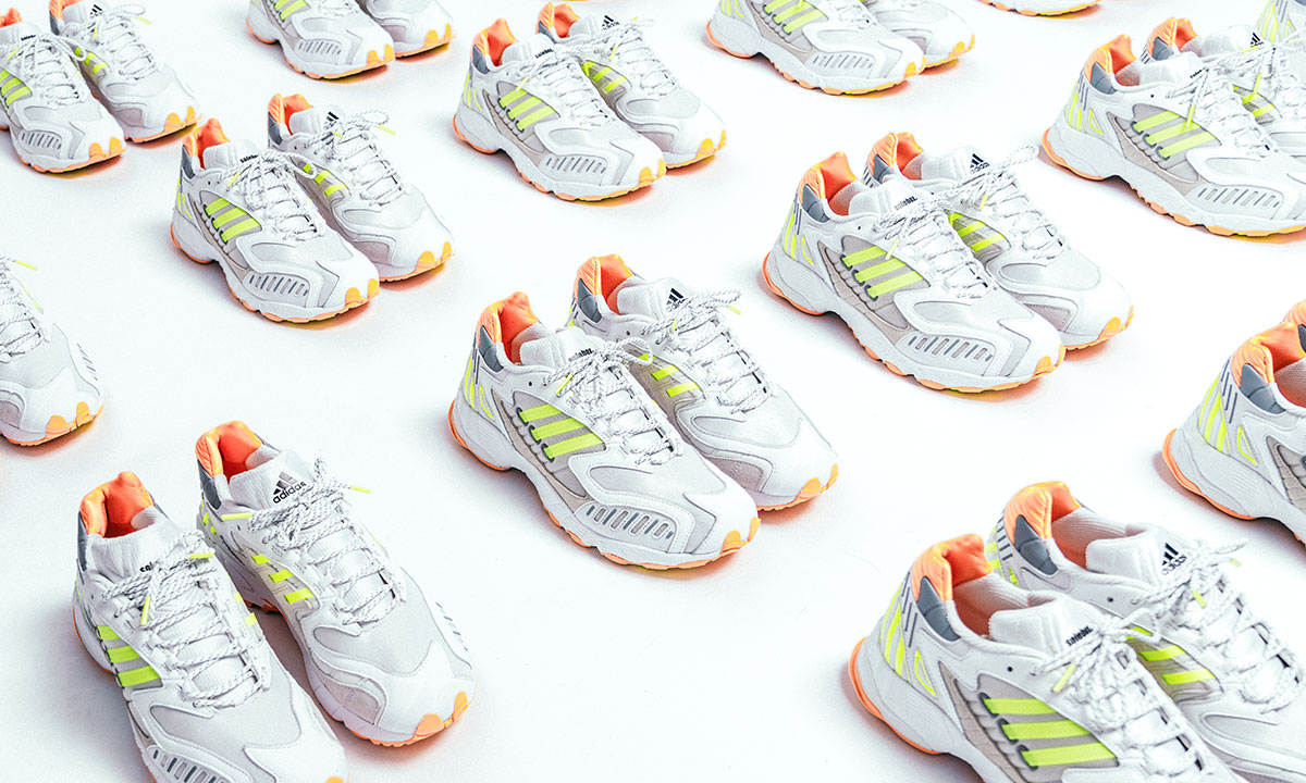 dozens of pairs of solebox x adidas torsion trdc sneakers on the floor