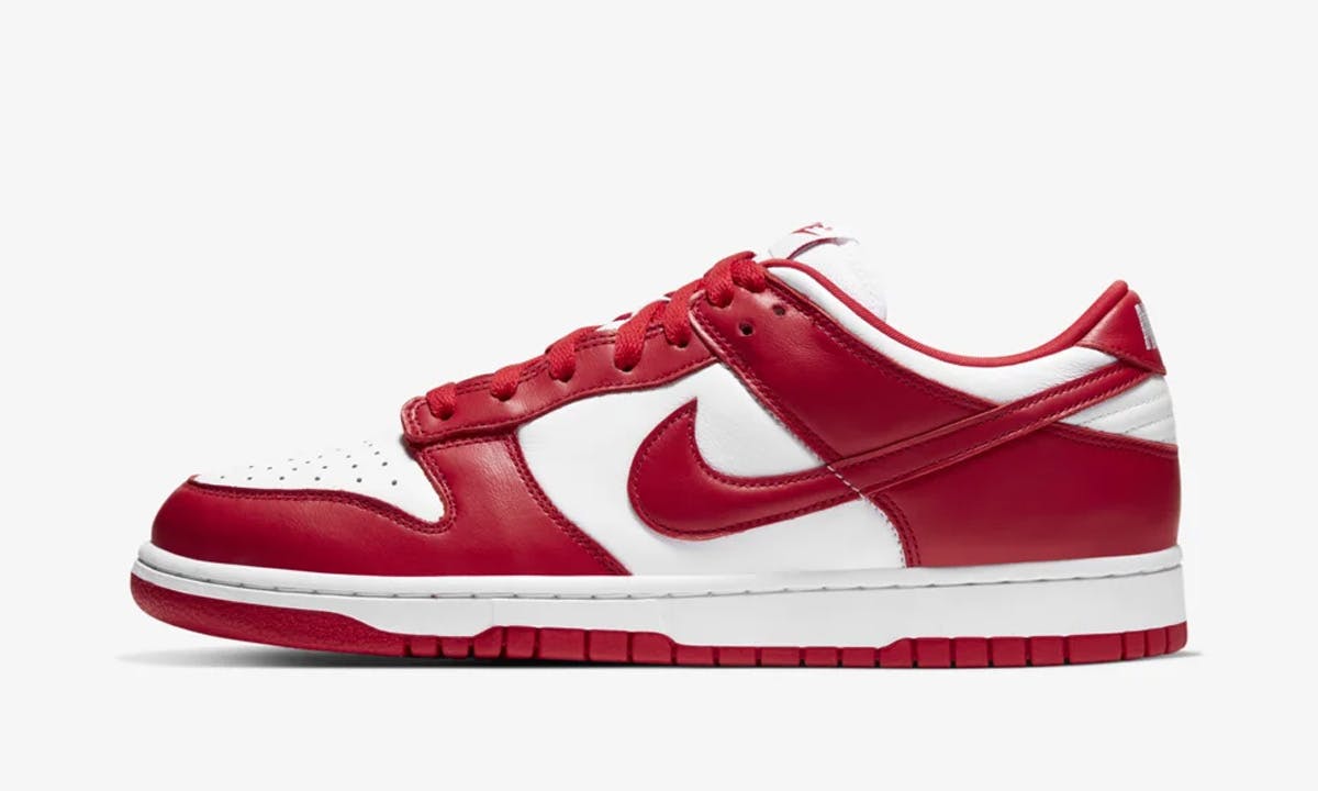 Red and white Nike Dunk Low side view