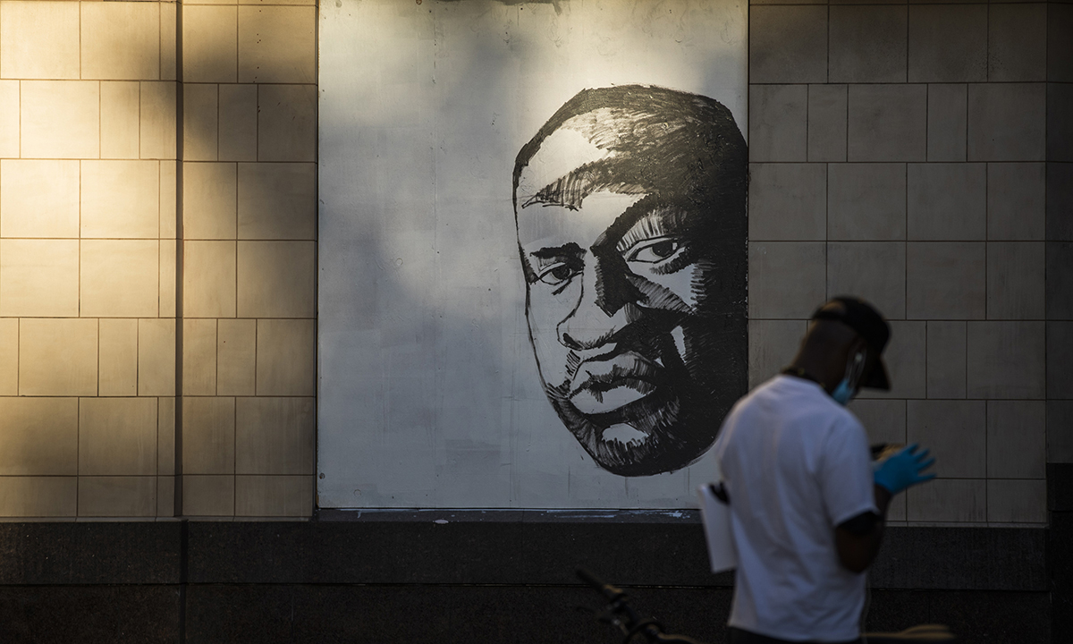A mural of George Floyd, who died on May 25 whilst in police custody in Minneapolis, is seen in downtown Oakland