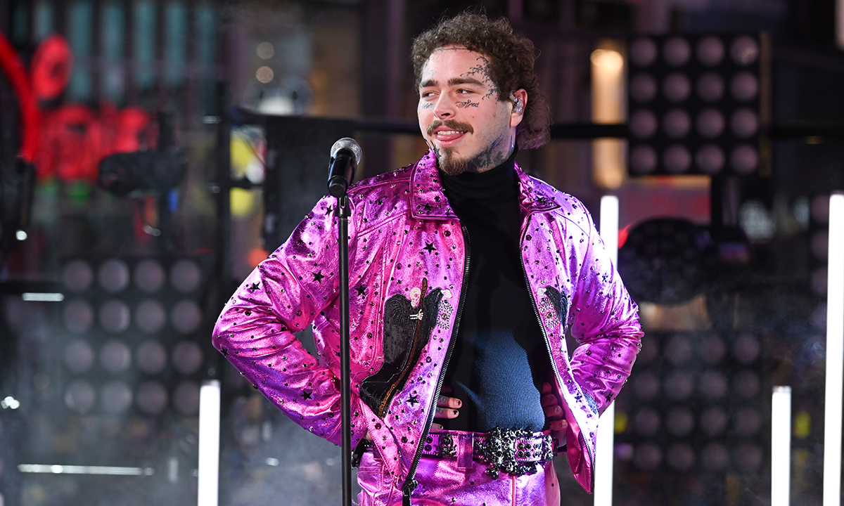 Post Malone performing pink jacket