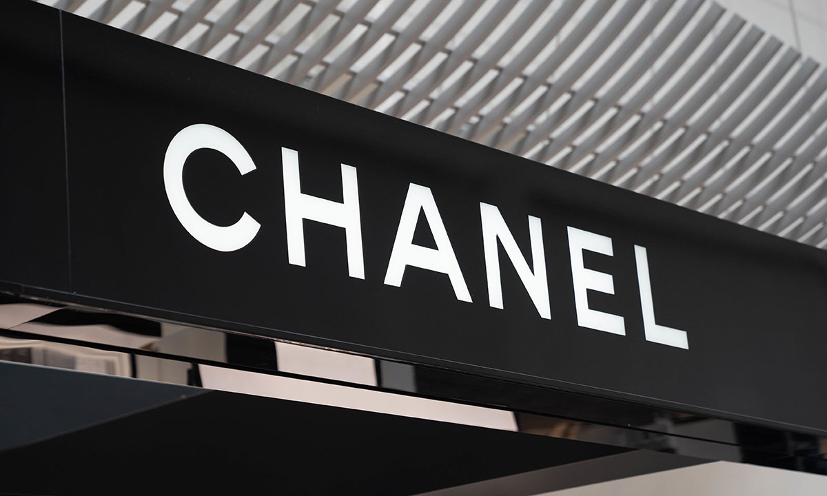 Chanel's camellias, empty chairs close Paris Fashion Week