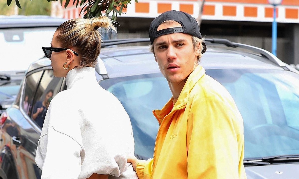 Justin Bieber in canary yellow Drew House tracksuit and Hailey Bieber celebrating his 26th Birthday in LA