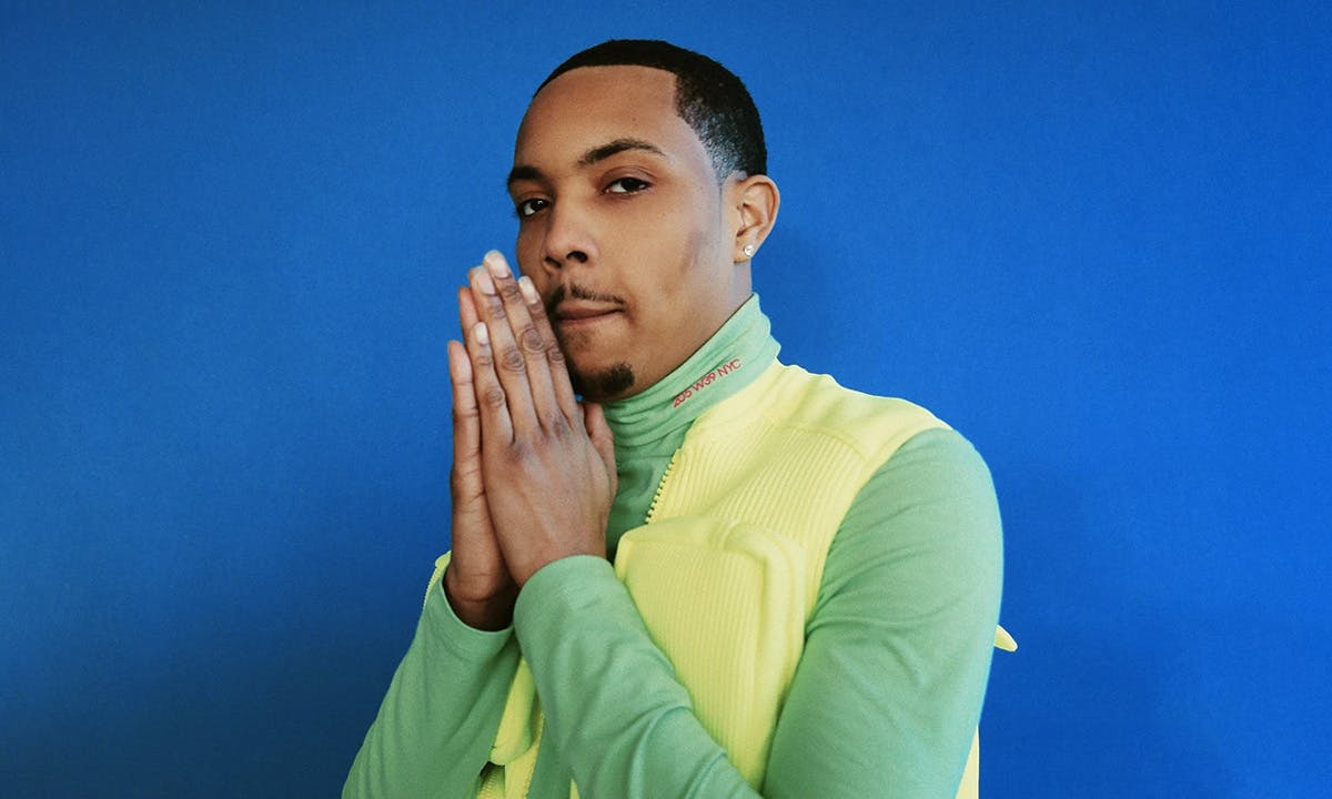 G Herbo prayer hands blue background