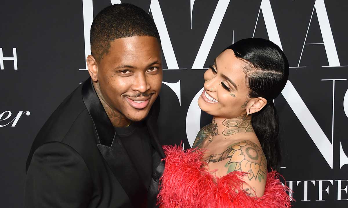 YG and Kehlani smiling on the red carpet