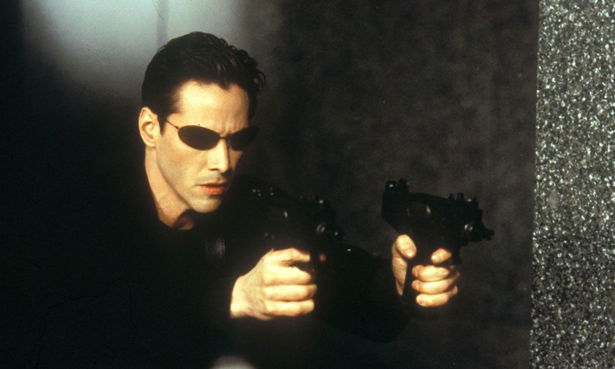 Keanu Reeves as neo in The Matrix