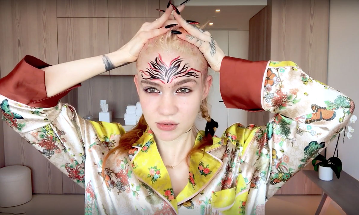 Grimes does her makeup for vogue