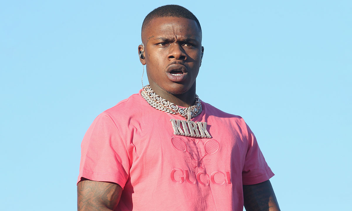 DaBaby performing at Astroworld in pink shirt
