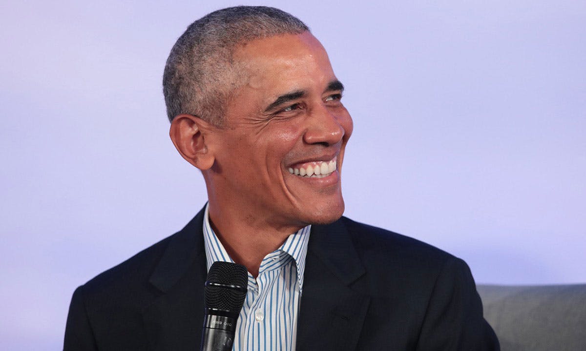 barack obama smiling purple background