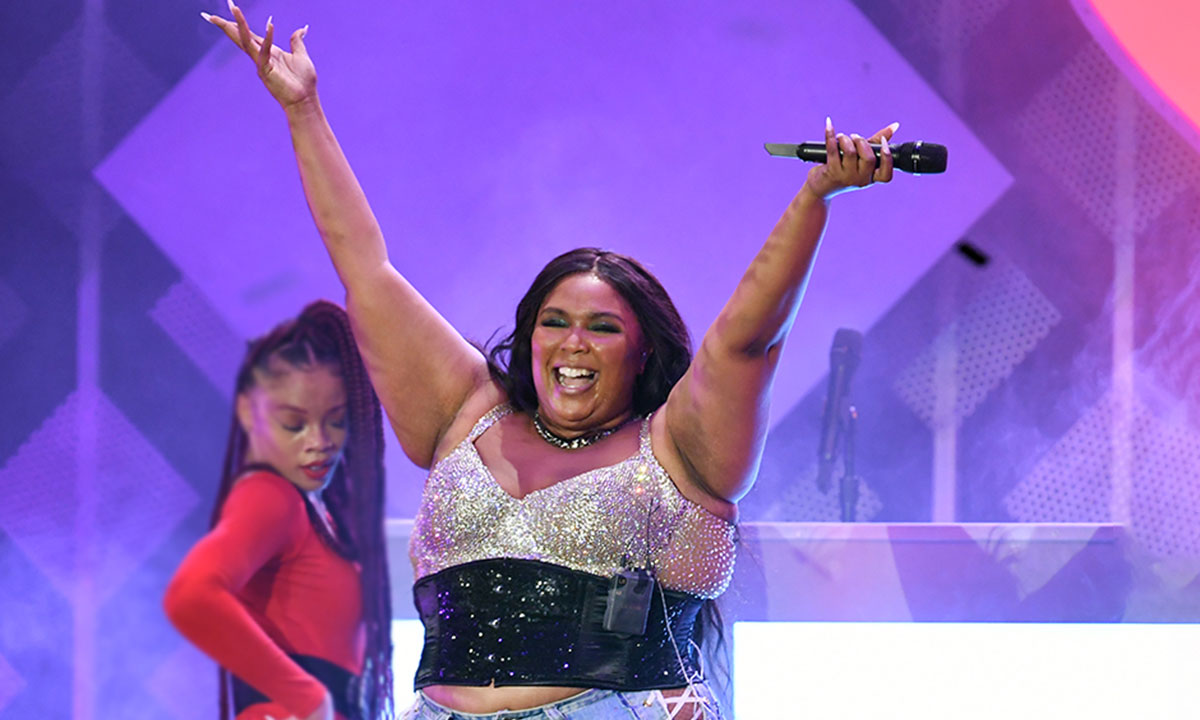 lizzo performs with dancer