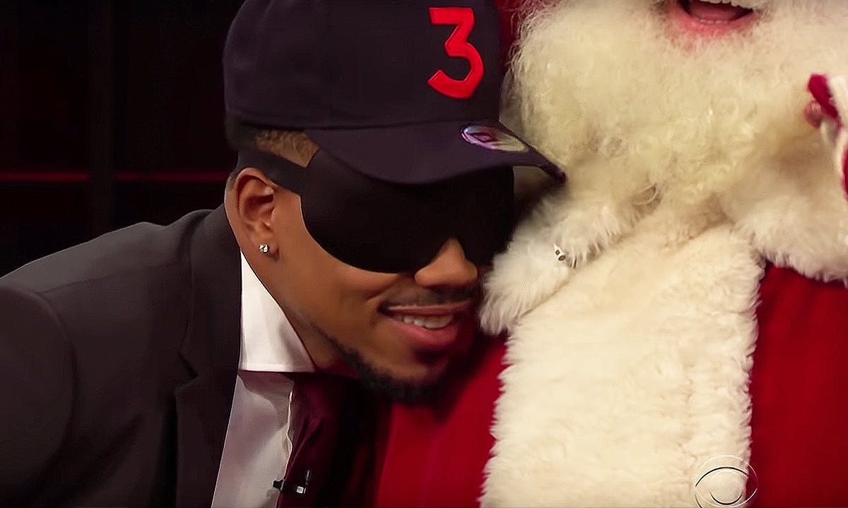 Chance the Rapper nuzzles Santa