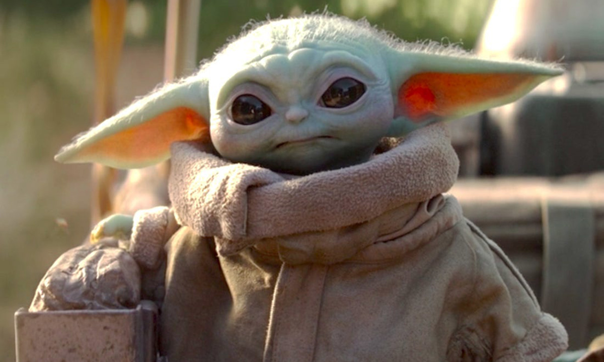 baby Yoda adorably holds a basket
