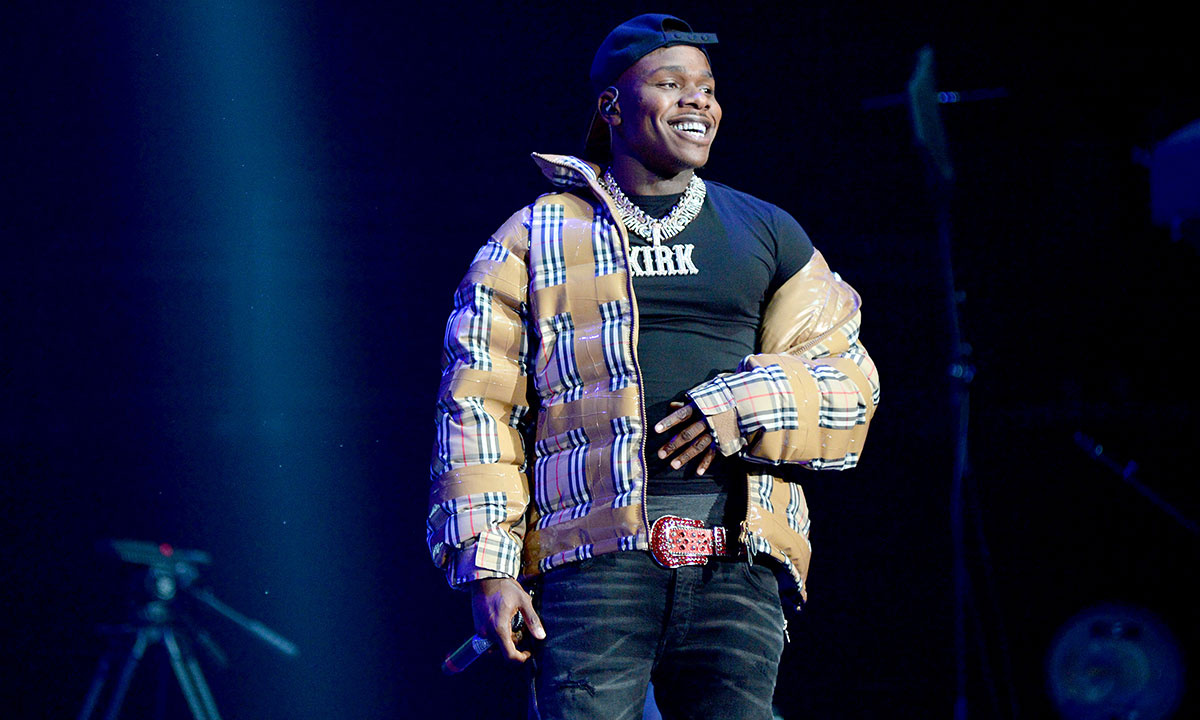 DaBaby onstage wearing Burberry puffer