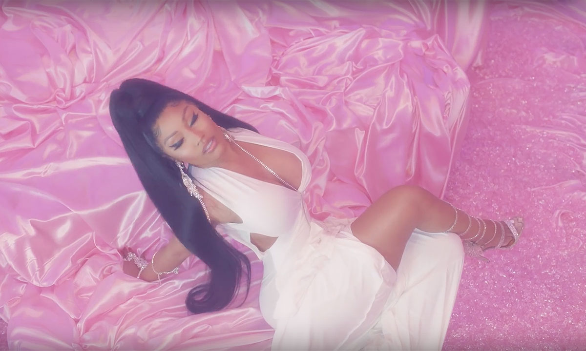 Nicki Minaj white dress pink background
