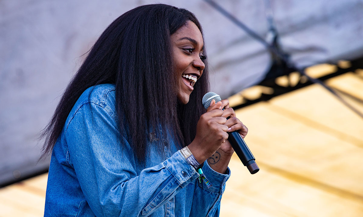noname performing jeans jacket