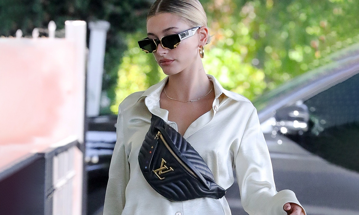 Hailey Bieber Matches $1,800 Louis Vuitton Bag With Satin Pajamas