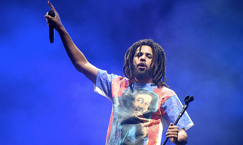 j. Cole performs wearing bob Marley t-shirt