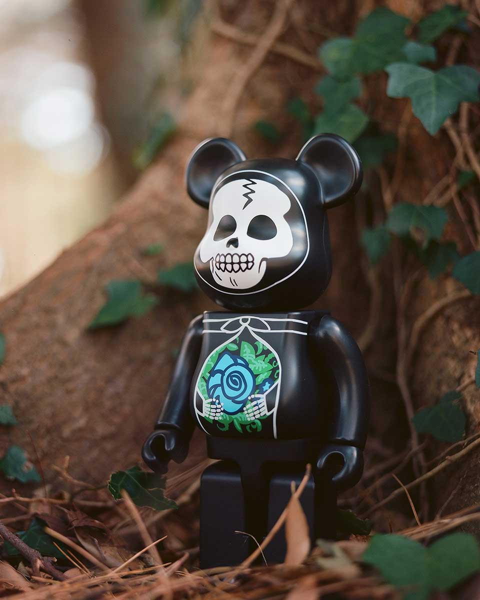 bearbrick suicoke collab toy figure in forest
