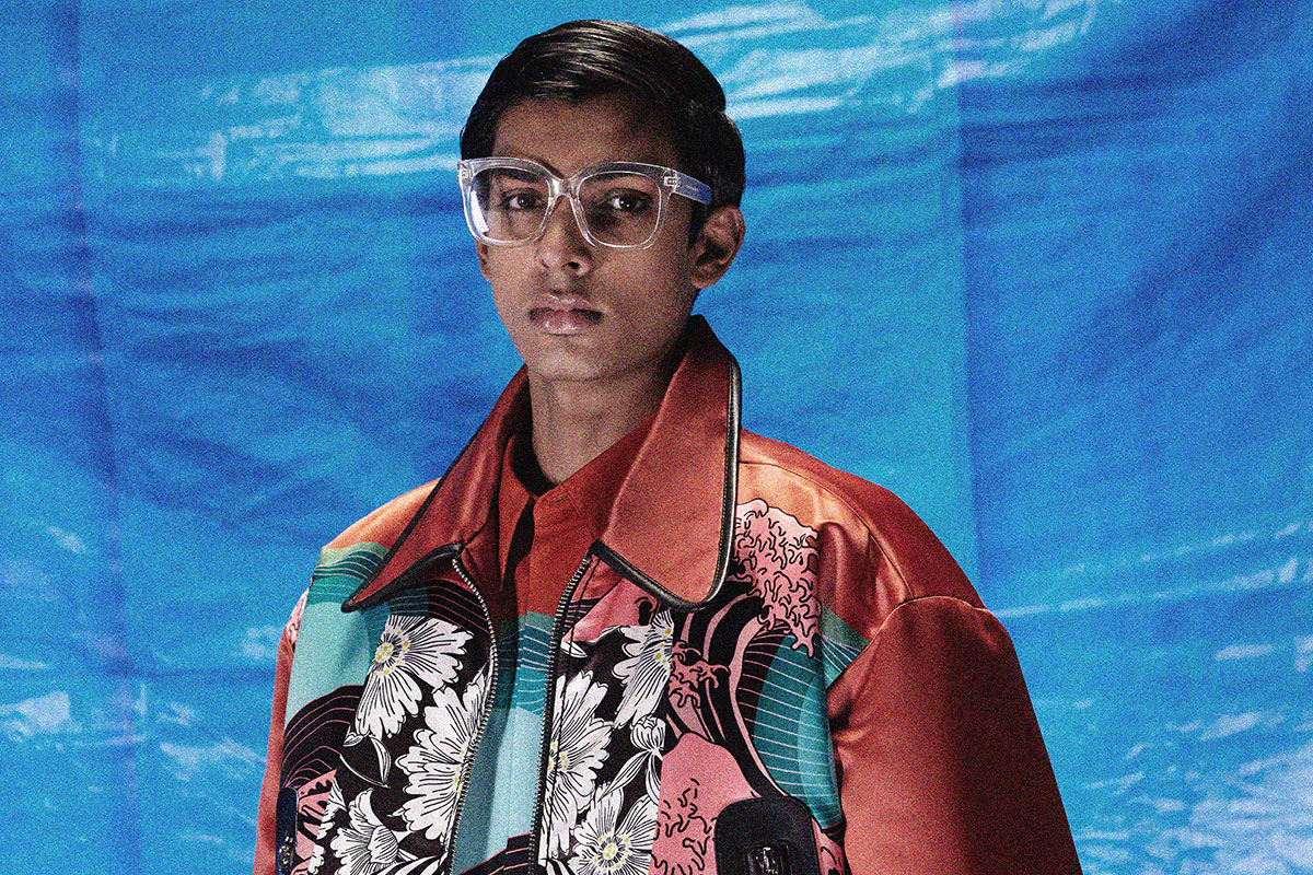 Model wearing a Dhruv Kapoorred leather jacket with colorful embroidery