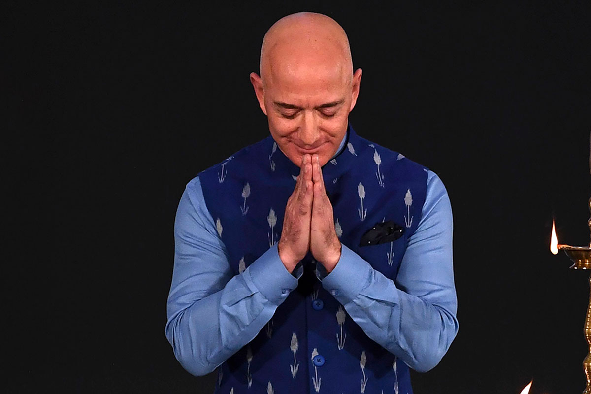 Jeff Bezos greets during Amazon event in India
