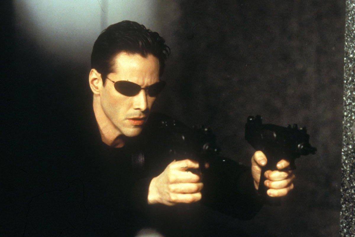Keanu Reeves as neo in The Matrix