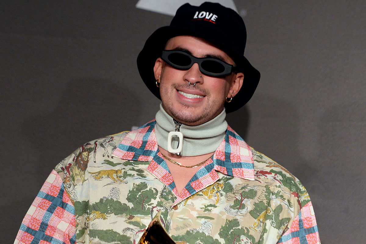 Bad Bunny poses in the press room with grammy