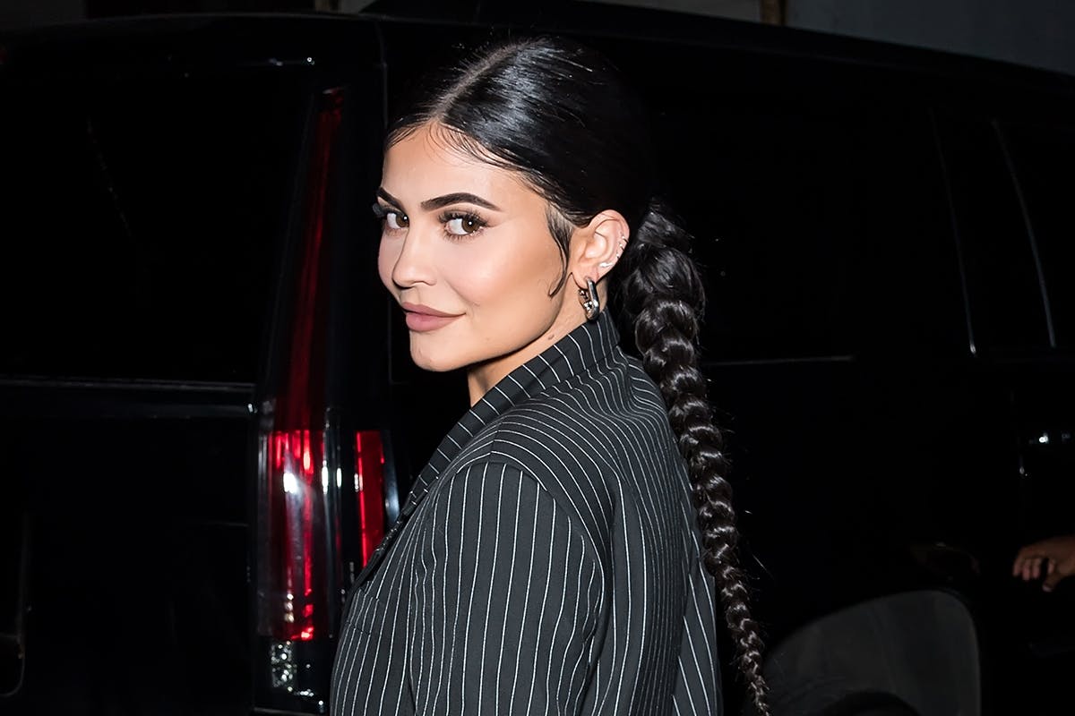 Kylie Jenner flashes skin in Louis Vuitton monokini and scarf