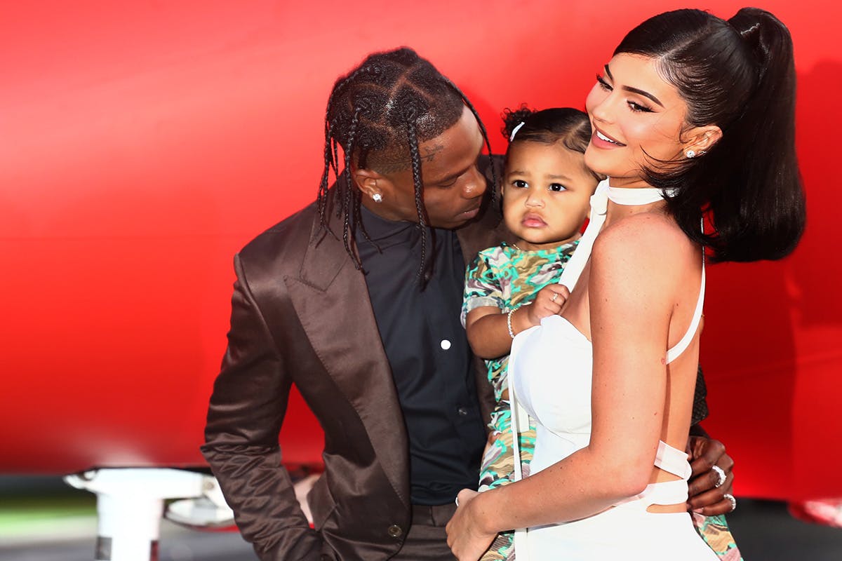 Travis Scott, Kylie Jenner and daughter Stormi attend premier