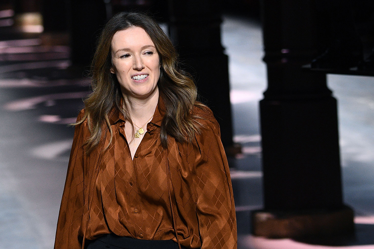 Clare Waight Keller, acknowledges the audience at the end of the Women's Spring-Summer 2020
