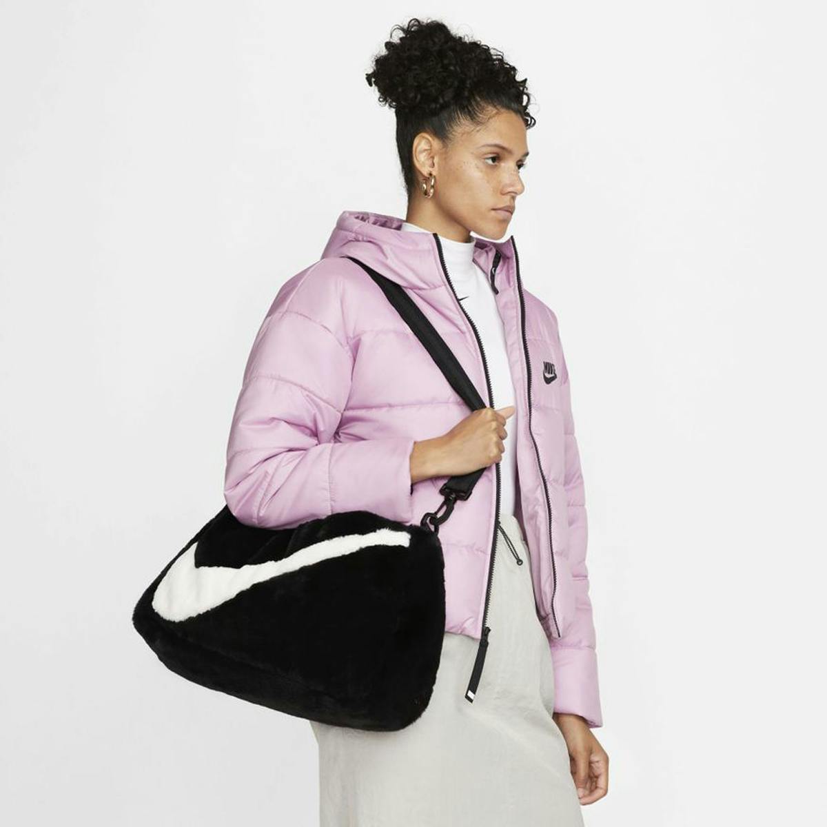 Nike Turns Its Big Swoosh Fur Jacket Into a Tote Bag