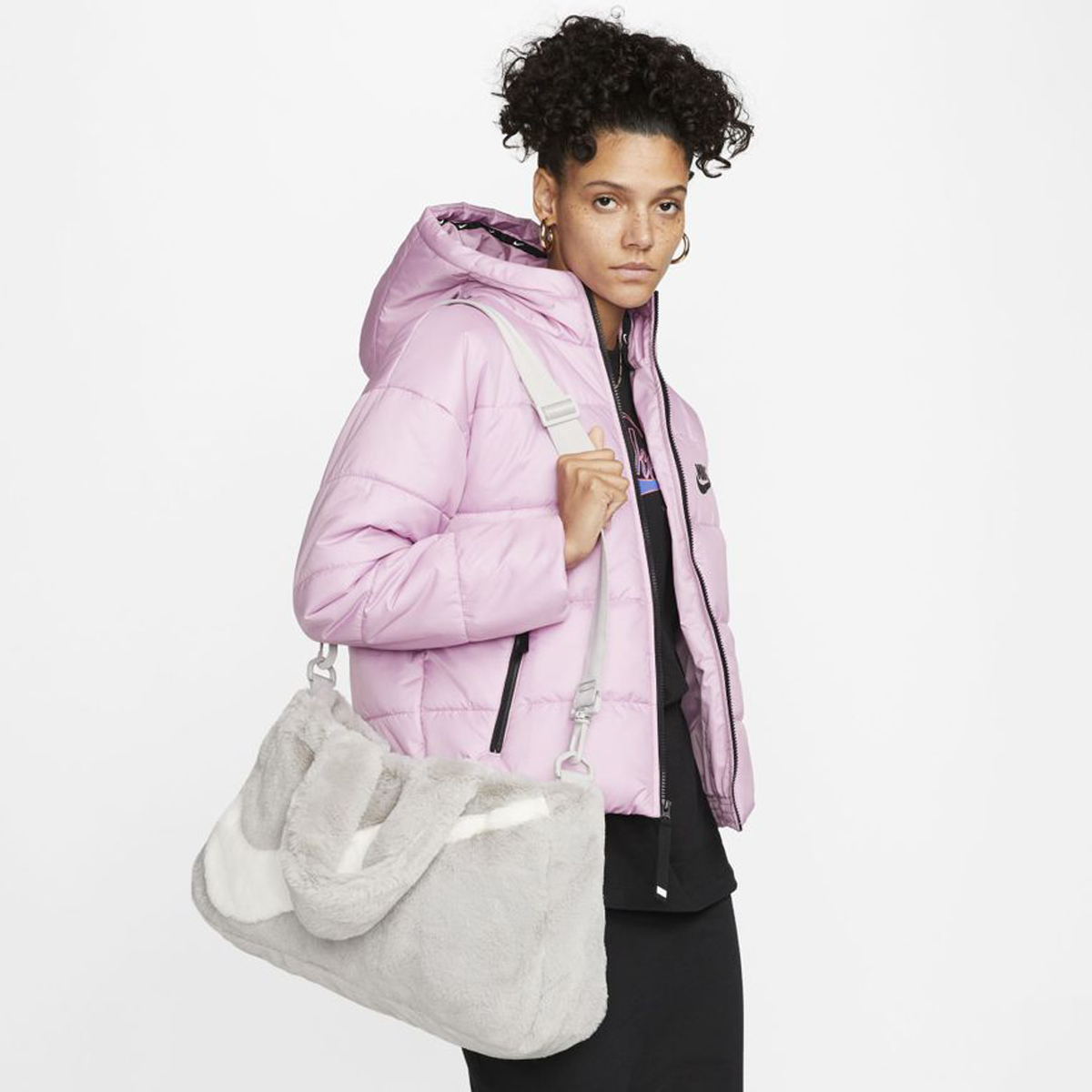 Nike Turns Its Big Swoosh Fur Jacket Into a Tote Bag