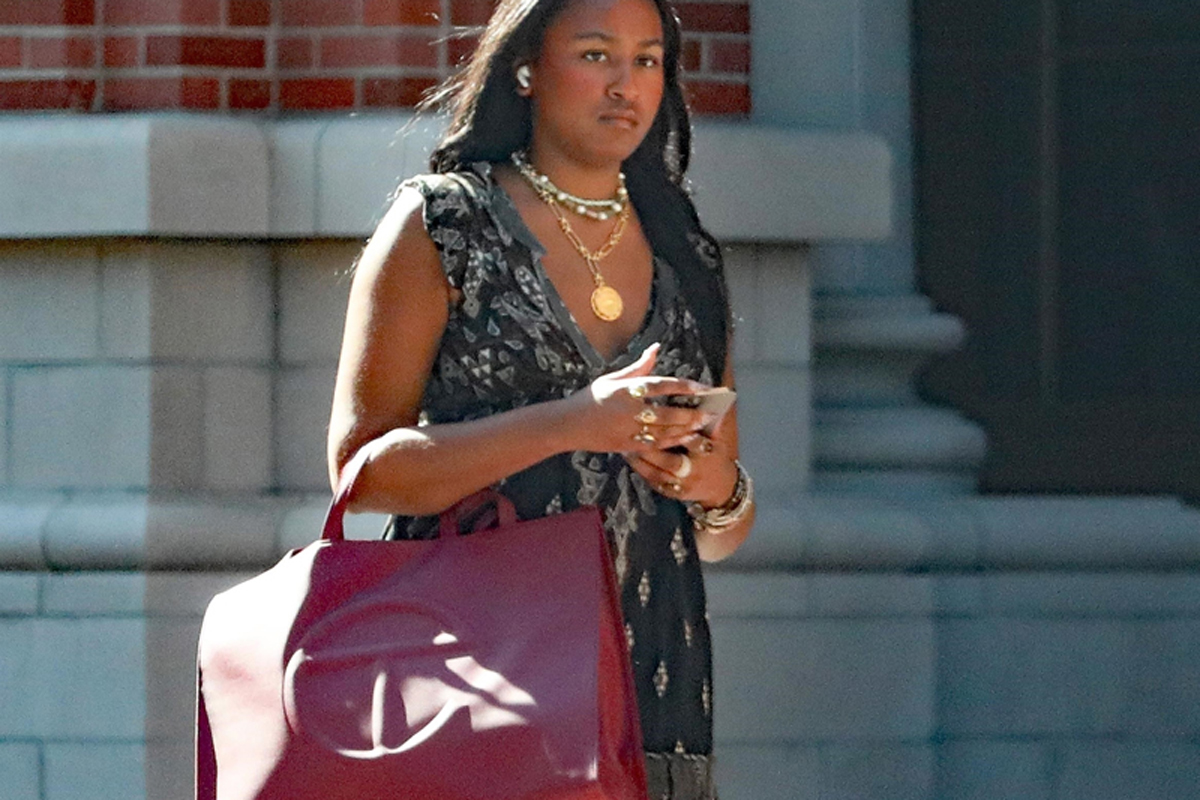 Sasha Obama wears one of the season's trendiest unisex bags