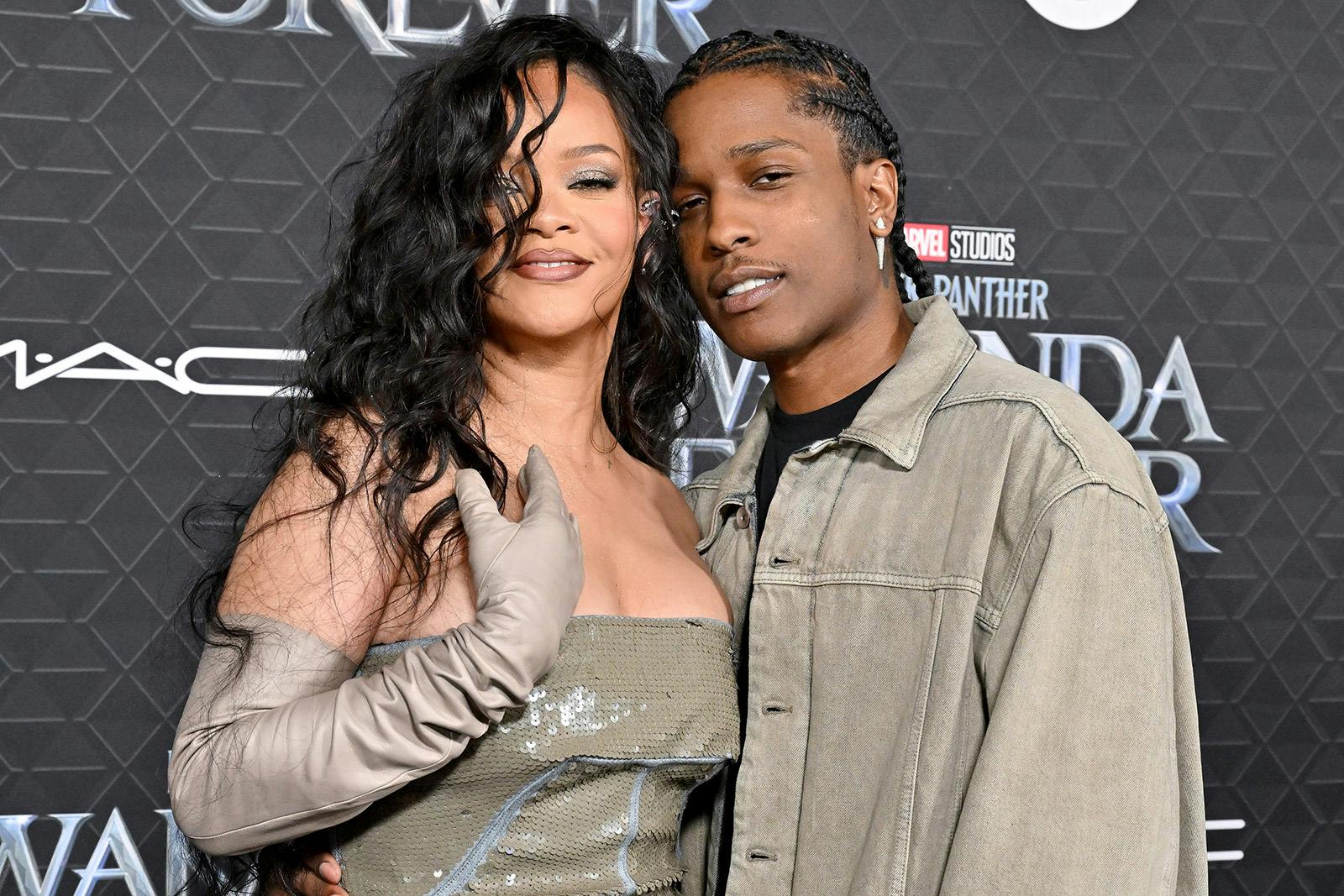 Rihanna turns up the heat in mini dress as she gets cozy with A$AP Rocky;  check out pics - Entertainment News