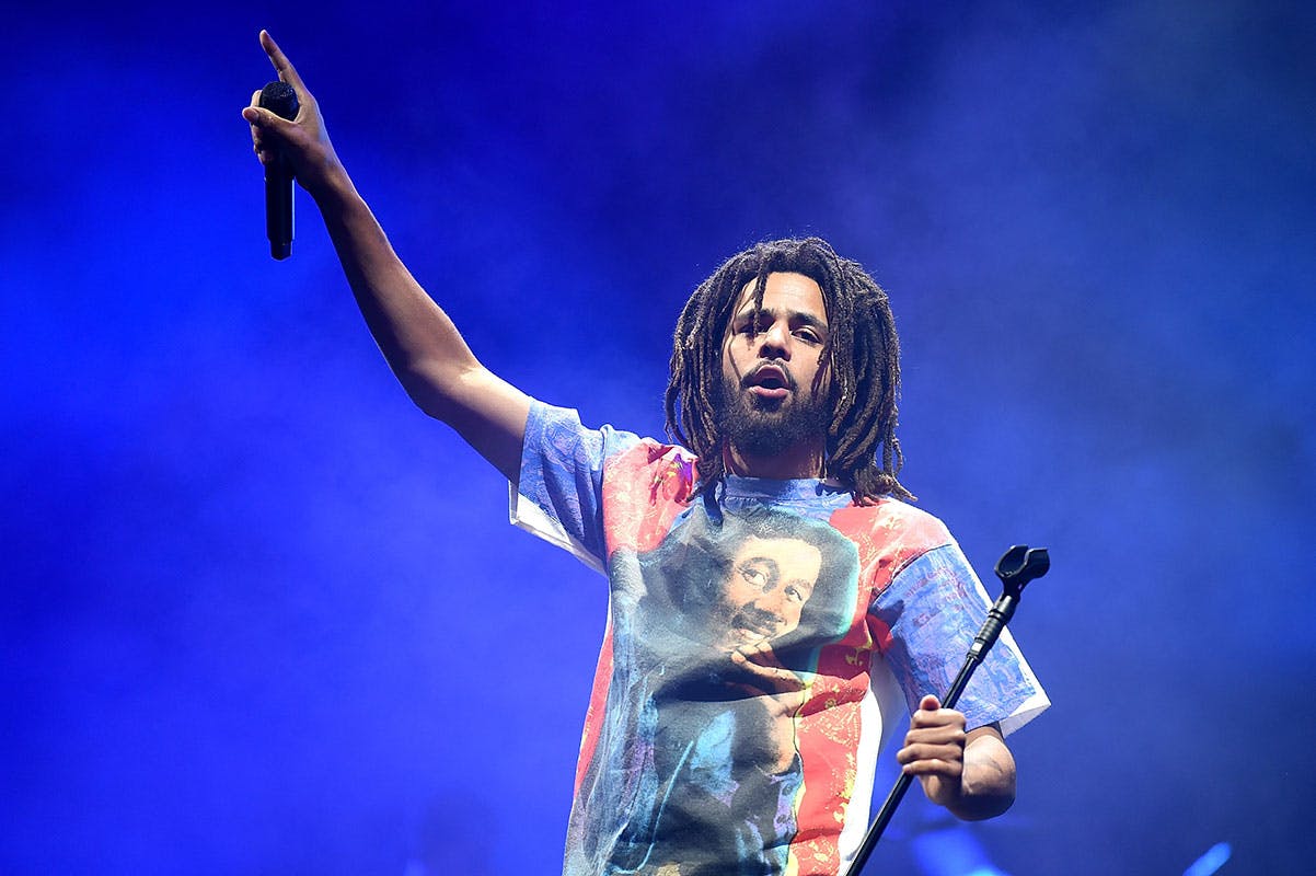 j. Cole performs wearing bob Marley t-shirt