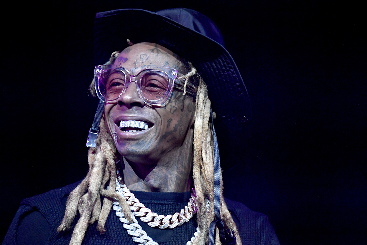 Lil Wayne glasses hat smiling