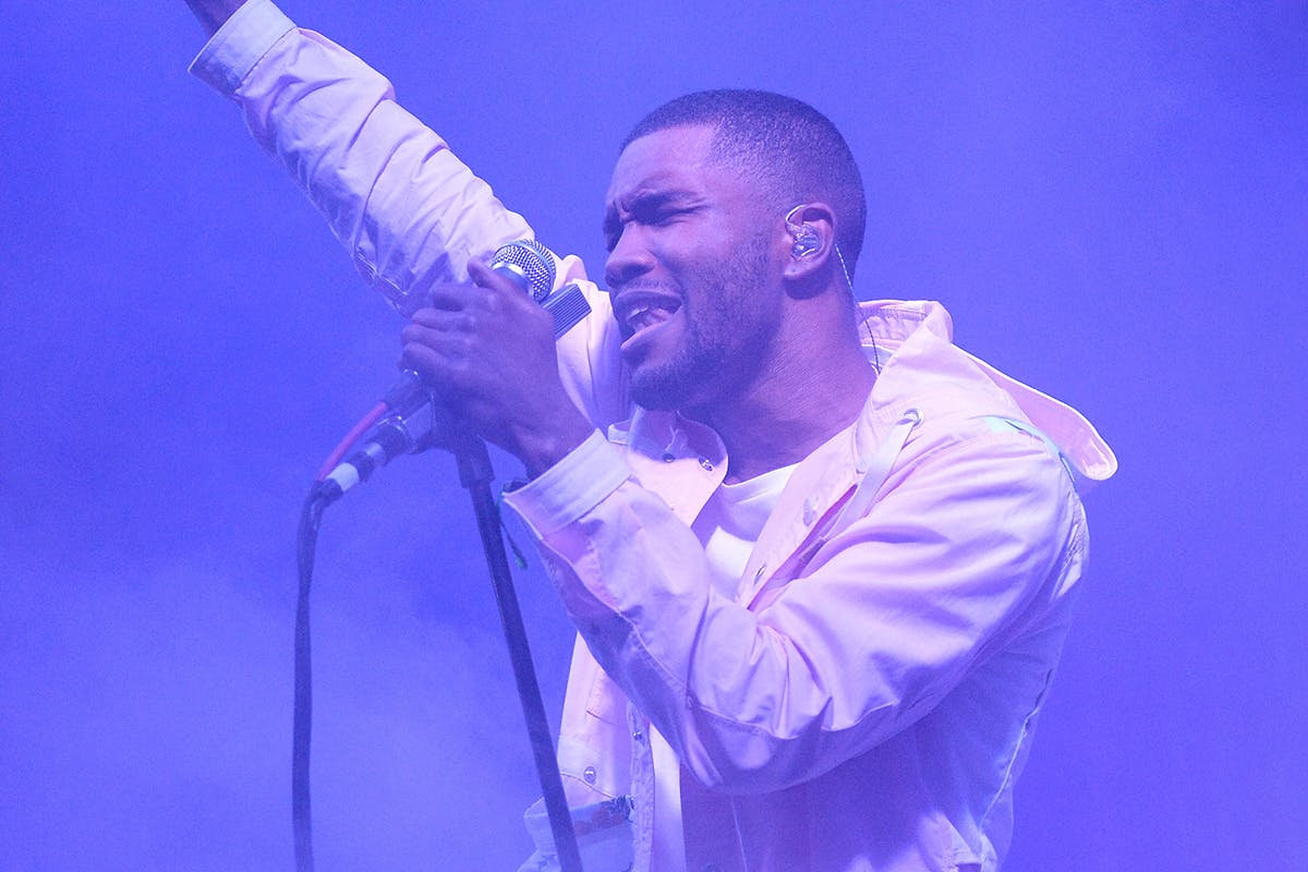 Frank Ocean Bonnaroo pointing purple smoke