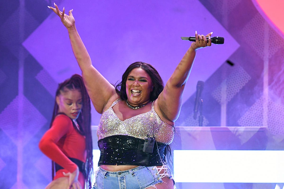 lizzo performs with dancer