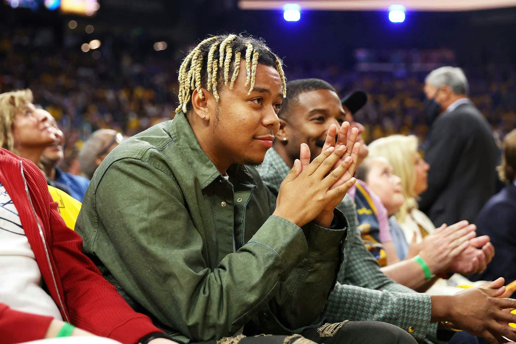 Lil Baby Sitting Courtside In a Louis Vuitton Hat & Jacket With