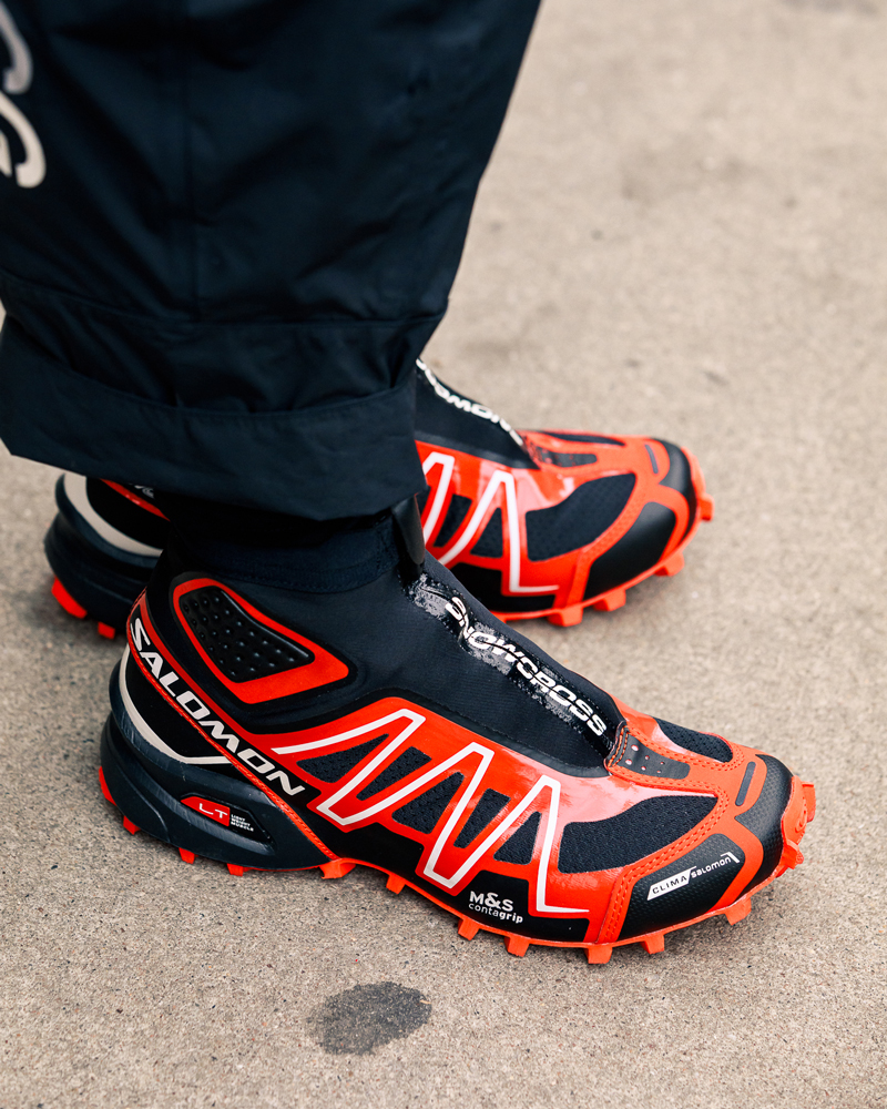Salomon red and black sneakers