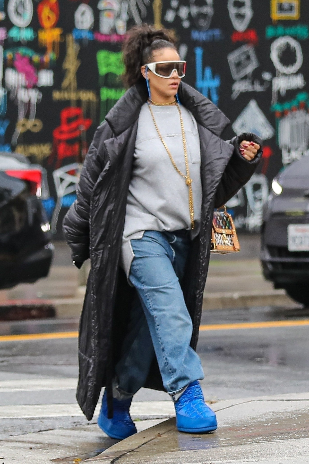 Rihanna Styles Out in Gucci Vault Moon Boots and Louis Vuitton