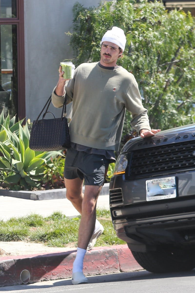 Jacob Elordi carrying a Bottega Veneta handbag