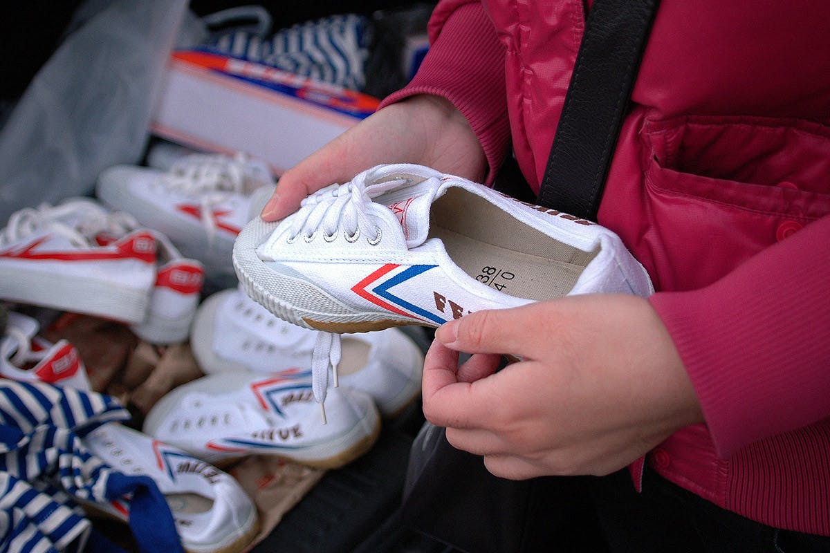 China Daily on X: Just look at the size of these shoes! Specially made by  Jinjiang-based #Anta Sports for Argentinian hoops star Luis Scola of the  Shanxi Brave Dragons, these size 53