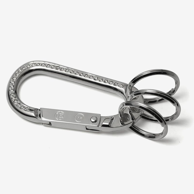 uniform experiment 18k gold carabiner IVXLCDM