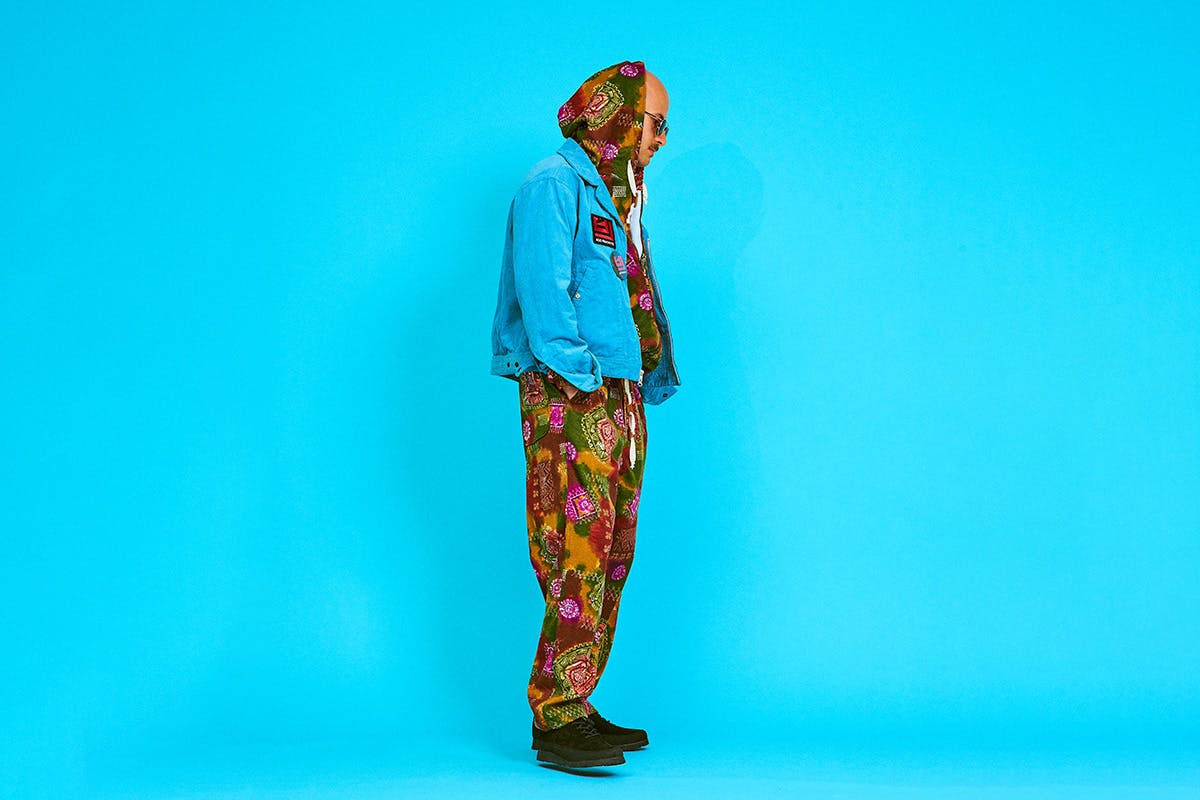 AiE SS20 patterned pants blue background