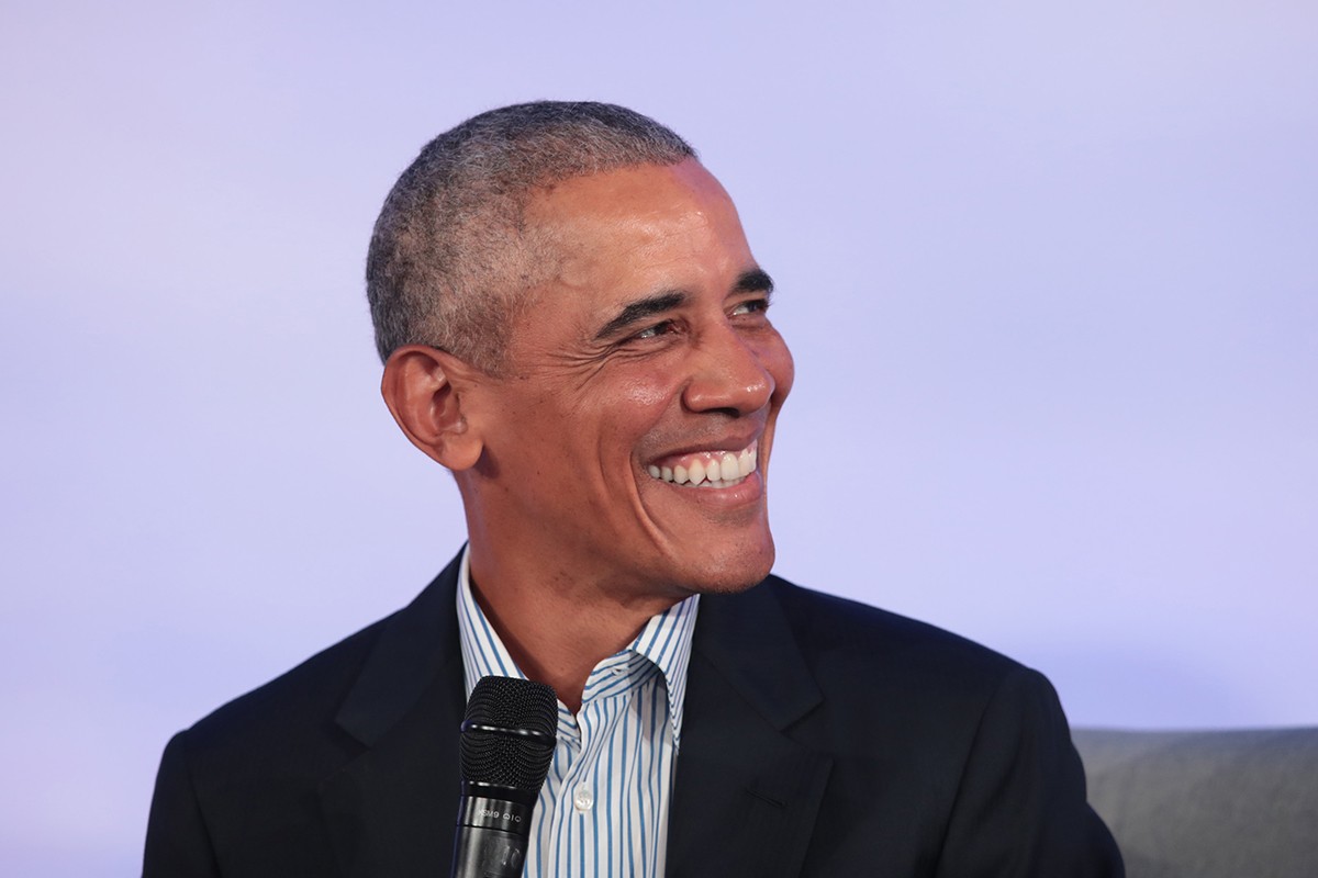 barack obama smiling purple background