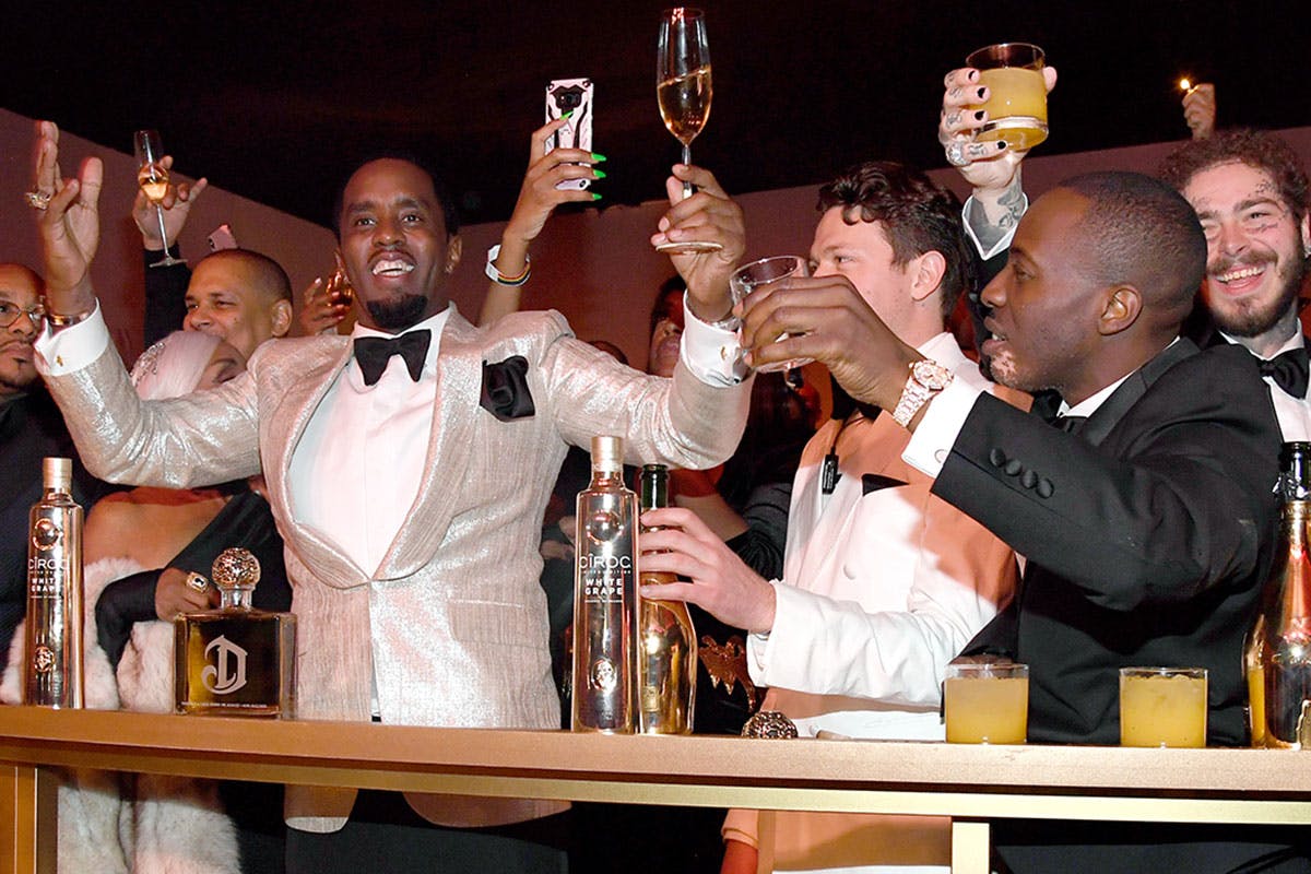 diddy toasting at his birthday bash