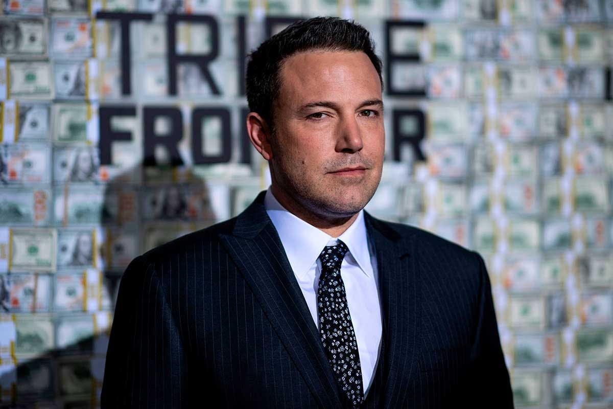 Ben Affleck poses as he arrives for the world premiere of "Triple Frontier"