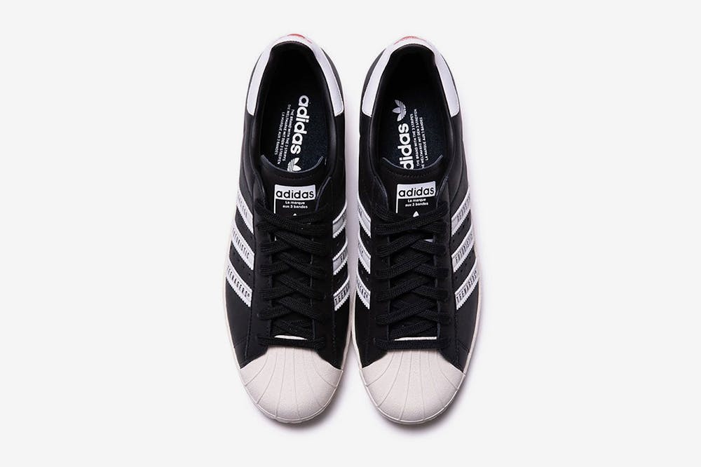 adidas gazelle silver green womens Adidas x Foot Industry Unisex Superstar White / Black Low Top Sneakers main image 1